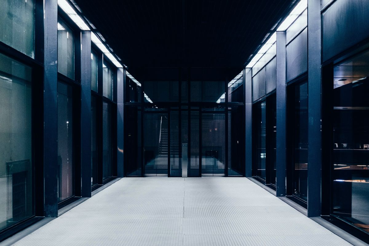 Corridor between rows of server cabinets in a data centre